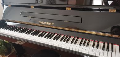 Pianoforte marca shillerman con metronomo