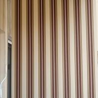 Tenda da sole a caduta verticale. 