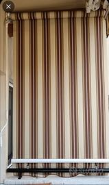 Tenda da sole a caduta verticale. 