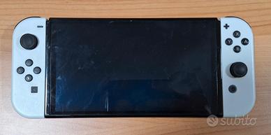 Nintendo Switch Oled Bianca + 4 giochi