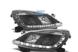 FARI OPEL CORSA D 06-10 LUCE DIURNA FONDO NERO