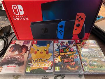 Nintendo Switch + giochi + microSD 128 + accessori