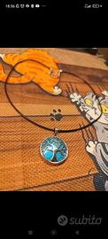 Collana con ciondolo tondo in acciaio albero vita