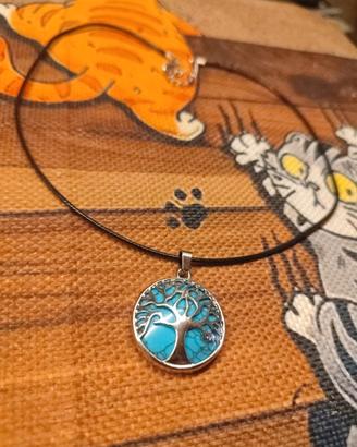 Collana con ciondolo tondo in acciaio albero vita