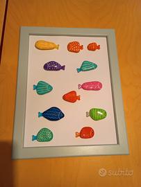 Quadretto di legno con pesciolini di sassi 