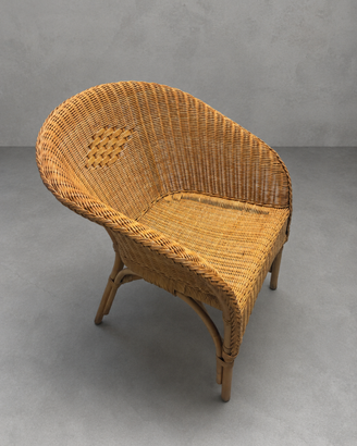 Poltrona vintage in vimini e rattan intrecciato