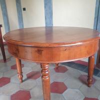Tavolo tondo antico dell'800 allungabile .