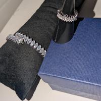 parure gioielli in acciaio e scintillanti zirconi