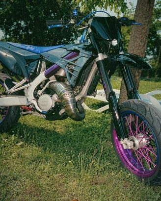 TM 125