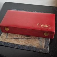 scatola da gioco, in pelle rossa