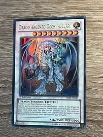 Drago argento occhi azzurri