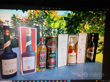 Liquori con scatola in lamiera mai aperti