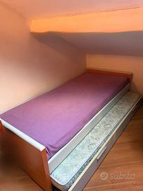 Letti singoli con letto supplementare sotto
