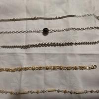 5 bracciali, orecchini e 3 pendenti in argento 