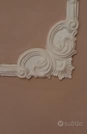 decorazione muro e legno in gesso alabastrino 