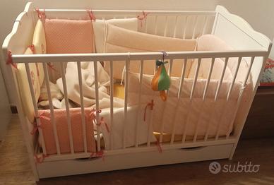 lettino neonato con sponda