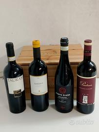 Quattro bottiglie di vino rosso 