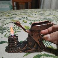 Accendino Vintage a forma di gru. 