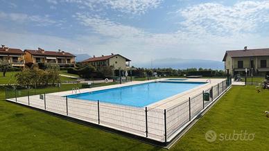 Ampio trilocale con piscina a Puegnago