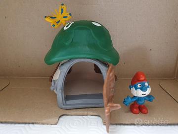 Casa dei puffi con grande puffo