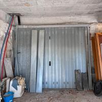 Saracinesca con porta incorporata