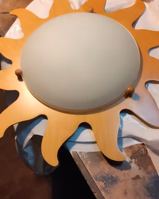 Plafoniera in legno forma di sole 