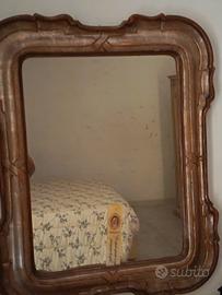 specchio con cornice in bronzo