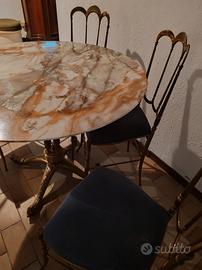 tavolo in onice con 4 sedie in ottone