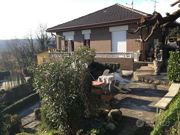 Villetta con box e giardino