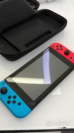 Nintendo Switch Neon (Mod. V2) + Custodia Rigida