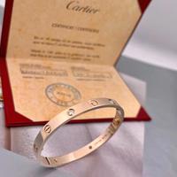 Bracciale Cartier LOVE in oro rosa con quattro dia