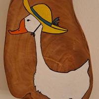 Quadro di legno di ulivo invecchiato con un'oca