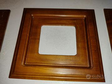 Salvaparete / cornici in legno per interruttori