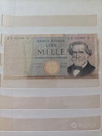 Banconota da 1000 lire con arpa verde e errore di 