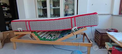 Letto con rete motorizzata