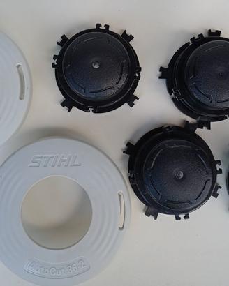 Avvolgifilo e coperchi per testine Stihl 