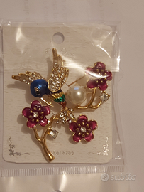 Spilla floreale + Collana fucsia