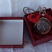 Orologio da taschino con bassorilievo in argento