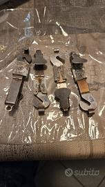 pesi per sviluppo negativo pinze