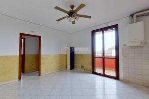 TRILOCALE CON 2 BALCONI CANTINA E GARAGE.