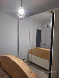 armadio scorrevole con letto( divano)