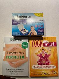 Libri e dispositivo monitor fertilità