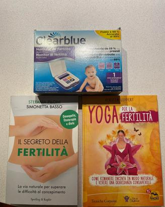 Libri e dispositivo monitor fertilità