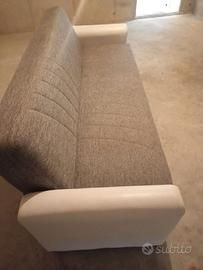 Divano letto praticamente nuovo grigio con braccio