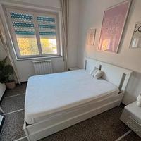 Letto matrimoniale in legno con cassettoni