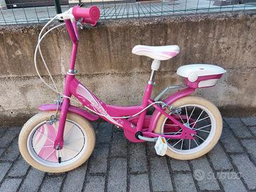 bici bambina 14" con bauletto,campanello e rotelle
