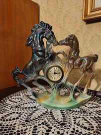 Orologio antico cavalli