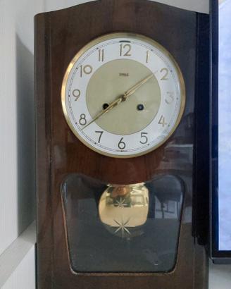 orologio pendolo a muro