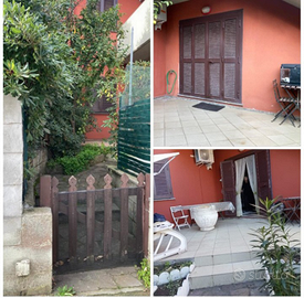 Appartamento con giardino e piscina condominiale