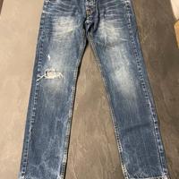 Jeans uomo a vita bassa con strappi Piazza Italia
